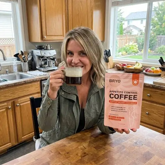 A customer enjoying BRYO coffee in a kitchen